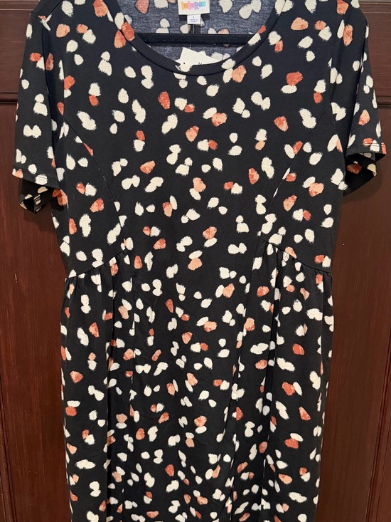 LuLaRoe Dresses & Skirts - LuLaRoe Black Top with Cream and Rust Spot Print